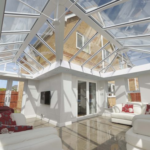 A white designer conservatory in Surrey.